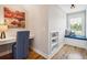 Upstairs study features built-in shelving and window seat at 2972 Anchor Watch Dr, Wadmalaw Island, SC 29487