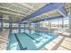 Indoor swimming pool with lap lanes and plenty of natural light at 506 Tranquil Waters Way, Summerville, SC 29486