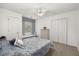 Cozy bedroom with window seat, double closets, and patterned bedding at 1005 Shinnecock Hills Ct, Summerville, SC 29483