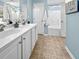 Spa-like bathroom with double sinks and a relaxing color scheme at 1005 Washitonia # C, Charleston, SC 29492