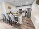 Well-equipped kitchen featuring stainless steel appliances and white cabinetry at 1005 Washitonia # C, Charleston, SC 29492