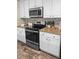 Modern kitchen with stainless steel appliances and granite countertops at 1005 Washitonia # C, Charleston, SC 29492