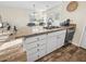Modern kitchen island with granite countertops and ample storage at 1005 Washitonia # C, Charleston, SC 29492