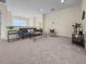 Open living area with gray sofa and neutral decor at 1005 Washitonia # C, Charleston, SC 29492