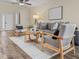 Bright living room with hardwood floors, comfy seating, and a cozy atmosphere at 1005 Washitonia # C, Charleston, SC 29492