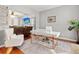 Bright home office features a white desk and hardwood floors at 1005 Washitonia # C, Charleston, SC 29492