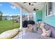 Relaxing back patio with seating area, grill, and string lights at 1016 Swamp Harrier Ave, Ravenel, SC 29470