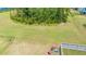 Large backyard with green grass and fire pit at 1016 Swamp Harrier Ave, Ravenel, SC 29470