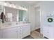 Double vanity bathroom with updated fixtures at 1016 Swamp Harrier Ave, Ravenel, SC 29470