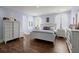 Bright bedroom with a queen-size bed and ample storage at 1016 Swamp Harrier Ave, Ravenel, SC 29470
