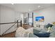 Spacious bonus room with comfortable seating and TV at 1016 Swamp Harrier Ave, Ravenel, SC 29470