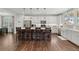 Modern kitchen featuring white cabinets, an island, and hardwood floors at 1016 Swamp Harrier Ave, Ravenel, SC 29470