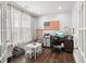 Home office with hardwood floors, desk, and table at 1016 Swamp Harrier Ave, Ravenel, SC 29470