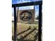 Community sign featuring birds on a wooden background at 1081 Irving Manigault Rd, McClellanville, SC 29458