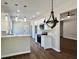 Modern kitchen featuring white cabinets, stainless steel appliances, and beautiful marble countertops at 1081 Irving Manigault Rd, McClellanville, SC 29458