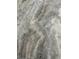 Detailed view of a granite countertop with a mix of gray, white, and tan tones at 1085 Irving Manigault Rd, McClellanville, SC 29458