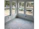 Spacious living area with abundant natural light and unfinished walls at 1085 Irving Manigault Rd, McClellanville, SC 29458