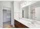Bathroom boasts double sinks, a large mirror, and a separate shower at 130 River Landing Dr # 8203, Charleston, SC 29492
