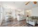 Open concept living and dining area with hardwood floors at 130 River Landing Dr # 8203, Charleston, SC 29492