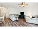 Spacious living room with sectional sofa and wood-look floors at 130 River Landing Dr # 8203, Charleston, SC 29492