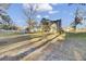 Spacious backyard with large trees and home view at 1401 Churchill Rd, Moncks Corner, SC 29461