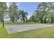 Outdoor basketball court with lake views at 1401 Churchill Rd, Moncks Corner, SC 29461