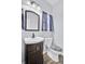 Clean bathroom with updated vanity and toilet at 1401 Churchill Rd, Moncks Corner, SC 29461