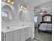 Double vanity bathroom with access to bedroom at 1401 Churchill Rd, Moncks Corner, SC 29461