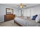 Bedroom with wood dresser and ceiling fan at 1401 Churchill Rd, Moncks Corner, SC 29461