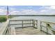 Rustic wooden pier with an American flag at 1401 Churchill Rd, Moncks Corner, SC 29461