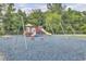 Playground with swings, slides, and play structures at 1401 Churchill Rd, Moncks Corner, SC 29461