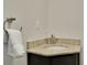 Small bathroom with granite countertop, sink, and towel rack at 15 Horlbeck Aly # A-7, Charleston, SC 29401