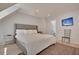 Bright bedroom with ensuite bathroom access and TV at 15 Horlbeck Aly # A-7, Charleston, SC 29401