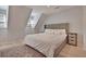 Spacious bedroom with a king-size bed and neutral decor at 15 Horlbeck Aly # A-7, Charleston, SC 29401