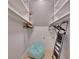 Large walk-in closet with shelving and hanging rods at 15 Horlbeck Aly # A-7, Charleston, SC 29401