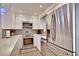 Updated kitchen featuring stainless steel appliances and white cabinets at 15 Horlbeck Aly # A-7, Charleston, SC 29401
