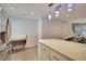 Modern kitchen features a large island, stainless steel appliances, and breakfast nook at 15 Horlbeck Aly # A-7, Charleston, SC 29401