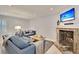 Cozy living room featuring a fireplace, comfortable seating, and a TV at 15 Horlbeck Aly # A-7, Charleston, SC 29401