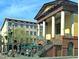 Historic building with a grand entrance and people shopping at 15 Horlbeck Aly # A-7, Charleston, SC 29401