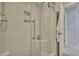 Clean shower with glass enclosure and pebble floor at 15 Horlbeck Aly # A-7, Charleston, SC 29401