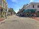 People strolling along a charming street lined with shops and businesses at 15 Horlbeck Aly # A-7, Charleston, SC 29401