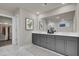 Elegant bathroom with double vanity, marble floors and walk-in shower at 2018 Quiet Ibis Rd, Hanahan, SC 29410