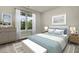 Bright bedroom featuring a comfortable bed and window views at 2018 Quiet Ibis Rd, Hanahan, SC 29410