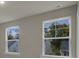 Bedroom with two large windows offering natural light at 2018 Quiet Ibis Rd, Hanahan, SC 29410