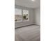 Spacious bedroom with neutral carpeting and large windows at 2018 Quiet Ibis Rd, Hanahan, SC 29410