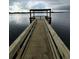 Wooden pier extending over calm water with a covered gazebo at 2018 Quiet Ibis Rd, Hanahan, SC 29410