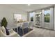 Home office with built-in shelving and desk at 2018 Quiet Ibis Rd, Hanahan, SC 29410