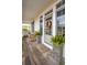 Welcoming front porch with potted plants and a doormat at 2524 Willbrook Ln, Mount Pleasant, SC 29466