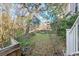 Large backyard with wooden fence and tree at 3706 Tip Ln, Mount Pleasant, SC 29466