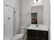 Modern bathroom with a shower and dark vanity at 440 Coopers Hawk Dr, Summerville, SC 29483